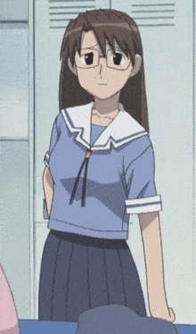 a girl with glasses and a blue shirt is standing in front of lockers .
