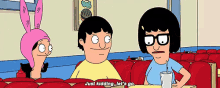 bob 's burgers characters bob and tina are sitting at a table talking to each other .