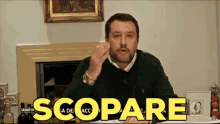a man giving a speech with the word scopare in yellow