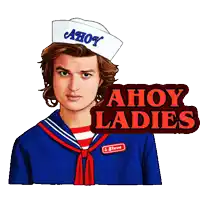 a man in a sailor outfit is standing next to a sign that says " ahoy ladies "