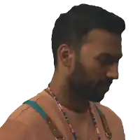 a man with a beard and suspenders looks to the side