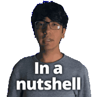 a man wearing glasses has the words in a nutshell on his shirt
