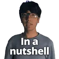 a man wearing glasses has the words in a nutshell on his shirt