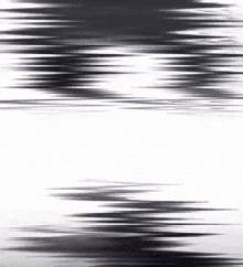 a black and white background with a lot of lines and shadows