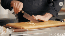 Chopping Garlic Chopping GIF - Chopping Garlic Chopping Knife Skills GIFs
