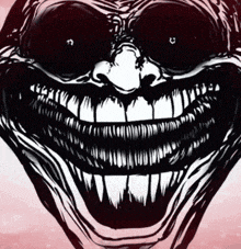 a black and white drawing of a monster 's face with a large smile