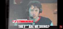 a hockey player with a microphone on his head and the words " the f *** are we doing " above him