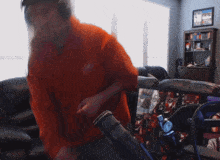 a blurry picture of a man dancing in front of a microphone