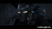 a giant robot is fighting a giant robot in a dark cave .