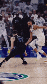 a basketball player with the number 77 on his back