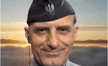 a man wearing a hat with a eagle on it