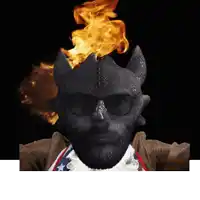 a man with a beard wearing sunglasses and a helmet with flames on it