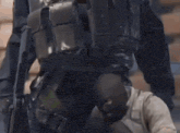 a man in a black mask is standing in front of a screen that says your match ready