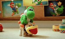 a stuffed yoshi is riding on the back of another stuffed animal