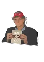 a man holding a card that says cal you on it