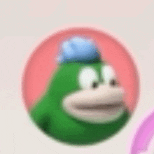 a green cartoon character with a blue hat is standing in a pink circle .