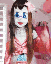 a doll with glasses and a bow on her head is standing in front of a window