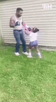 Father Daughter Boxing This Is Happening GIF - Father Daughter Boxing This Is Happening Training GIFs