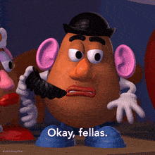 a mr potato head says let 's roll on a poster