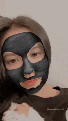 a woman with a black mask on her face and the words good night miss miss on the bottom