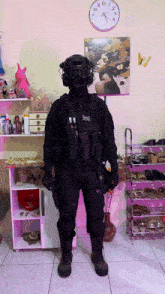 a man in a military uniform is standing in front of a clock that shows the time as 10:13