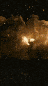a large explosion with a lot of smoke and fire coming out of it