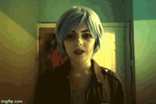 a woman wearing a blue wig is standing in front of a door with imgflip.com at the bottom