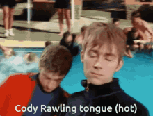 a man with his eyes closed and the words cody rawling tongue hot