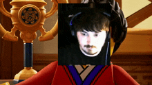 a lego figure with a picture of a man behind his face