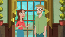 a man and woman are standing in front of a window