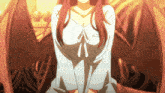 a woman with red hair and a white shirt is sitting on a chair
