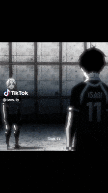 a blurry picture of a person walking in front of a wall with tiktok written on the bottom right corner