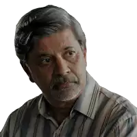 a man with a beard wearing a striped shirt looks to his left