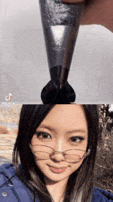 a woman wearing glasses is holding a metal object that says wilson on it