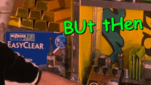 a box of hozeblock easyclear sits next to a pile of gold