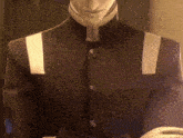 a close up of a man in a suit with white stripes