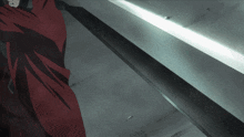 a man in a red cape is holding a sword
