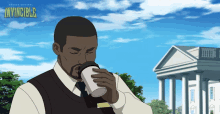 a man drinking from a cup with the word invincible on the bottom right