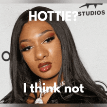 a picture of a woman with a caption that says hottie studios and i think not