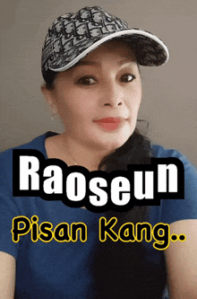 a woman wearing a hat with the name raoseun pisan kang written on it