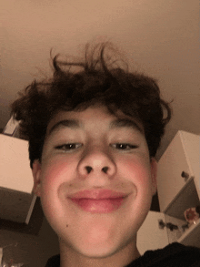 a close up of a person 's face with a smile on their face