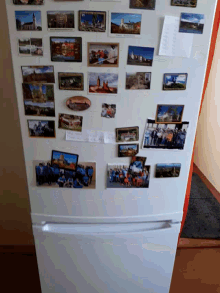 a white refrigerator with many magnets on it