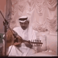 Abadi Playing Guitar GIF