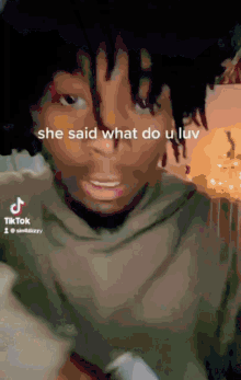 a tiktok video of a person saying she said what do you luv