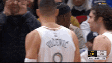 a basketball player wearing a jersey that says vicevic