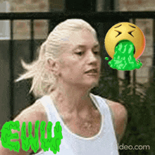 a woman with a smiley face vomiting green liquid
