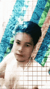 a grid of squares shows a man 's face with headphones on
