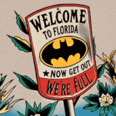 a sign that says welcome to florida with a batman symbol