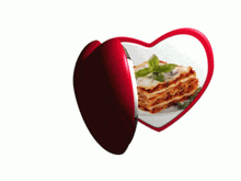 a heart shaped mirror has a picture of a microwave and a picture of lasagna