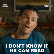 a man in a blue shirt says i don t know if he can read